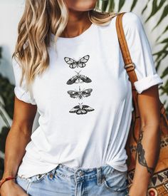 This retro simple butterfly design unisex t-shirt gives off a vintage vibe, perfect for casual everyday wear or as a statement piece. Ideal for those who love minimalist and nostalgic designs. Great for spring and summer outfitting, as well as nature lovers and fashion enthusiasts. Suitable for casual outings, picnics, or nature walks. Product features - 100% Airlume combed and ring-spun cotton fabric - Retail fit for casual and semi-formal settings - Manufactured in the US and internationally in a sustainable way - Tear-away label for minimized skin irritations - Variety of fabric blends available for different color options Care instructions - Machine wash: cold (max 30C or 90F) - Non-chlorine: bleach as needed - Tumble dry: low heat - Iron, steam or dry: medium heat - Do not dryclean Simple Butterfly Design, Tee Outfits, Simple Butterfly, Retro Minimalist, Butterfly Top, Vintage Vibe, Butterfly Design, Jersey Shirt