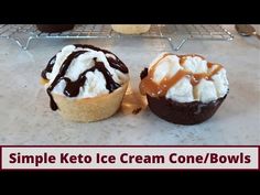 three ice cream cones sitting on top of a counter next to a rack filled with doughnuts