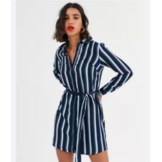 Tommy Hilfiger Women Navy Long Sleeve Striped Shirt Dress Size Xxs New Whit Tag. -Waist : 13.5 Inch Approx -Long. : 37. Inch Approx -Long Sleeves : 24 Inch. Approx -Contrast Stripes Evolve The Classic Shirtdress Into The Eye Catching Foundation Of A Chic Outfit With This Belted Option From Tommy Hilfiger. -Long Sleeves; Buttons At Cuffs Polyester/Elastane Machine Washable Imported Striped Fitted V-neck Shirt Dress, Striped Long Sleeve Mini Dress For Daywear, Fitted Striped Long Sleeve Shirt Dress, Fitted Striped V-neck Shirt Dress, Striped V-neck Fitted Shirt Dress, Fitted Striped Shirt Dress For Fall, Blue Cotton Collared Mini Dress, Blue Collared Cotton Mini Dress, Trendy Blue Collared Dress