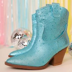 Be The Center Of Attention In These Sparkly Rhinestone Cowboy Boots New In Box Faux Leatherette Rhinestone Encrusted Uppers Lightly Padded Insole Chunky Block Heels Heel Height: 3 In. Fitting: True To Size. Regular Fit. Blue Rhinestone Boots With Pointed Toe, Blue Rhinestone Pointed Toe Boots, Blue Pointed Toe Boots With Rhinestones, Blue Rhinestone Boots For Spring, Spring Blue Boots With Rhinestones, Blue Party Boots With Rhinestones, Blue High Heel Boots With Rhinestones, Blue Rhinestone Party Boots, Blue Rhinestone Boots For Fall