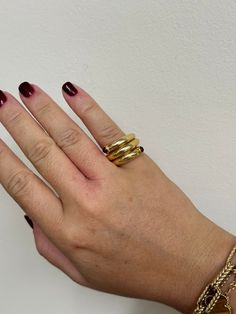 Tiffany & Co Schlumberger 18k gold wrap ring with two rubies. DESIGNER: Tiffany & Co MATERIAL: 18k Yellow Gold GEMSTONES: Ruby DIMENSIONS: Ring size 4.75, top is 14mm wide. MARKED/TESTED: Tiffany & Co, 18k, Schlumberger. WEIGHT: 22 grams CONDITION: Previously Owned / Excellent Condition Modern Gold Ruby Ring, Gold Open Sapphire Ring With Polished Finish, Modern Gold Ruby Ring With Polished Finish, Modern Gold Ruby Ring For Anniversary, Gold Open Ruby Ring, Gold Ruby Open Ring, Gold Ruby Open Ring Fine Jewelry, Gold Open Ruby Ring In 14k, 14k Gold Ruby Open Ring