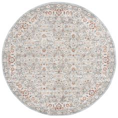 a round rug with an ornate design in grey and orange colors on a white background