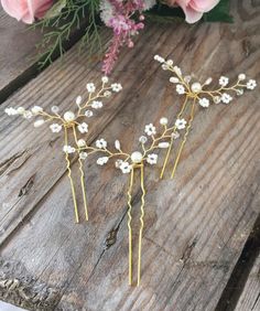 These beautiful and delicate hair pins are the finishing touch to any bridal or bridesmaids hairstyle.  Tiny pearl beads are used to create the look of gypsophila and a hint of Swarovski crystal adds a touch of sparkle.  Wear all three together to make an elegant statement, or spread the pins throughout the hair for a gentle and romantic look.  The pearls used throughout the pins are a very light ivory, perfect for a spring or winter wedding.  Each pin is made using gold wire and a gold hair pin Bridesmaids Hairstyle, Gypsophila Hair, Gold Hair Pins, Hair Accessories Gold, Bridal Hair Pins Pearl, Hair Pins Bridal, Gold Hair Pin, Bridesmaid Hair Accessories, Hair Accessories Pearl