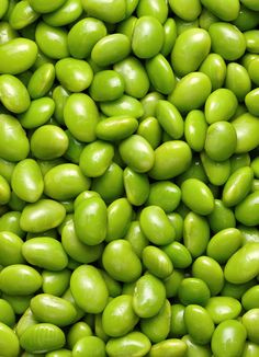 green peas are in a pile with the words pin scheduled via duck com on it