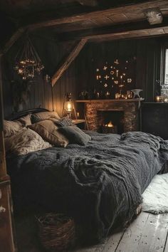 a bed sitting in a bedroom next to a window with candles on the windowsill