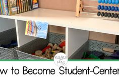 a white desk with bins filled with toys and books