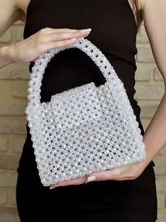 Crystal bag A universal bag made of crystal beads-shaped stones will be a great addition and highlight of your image. It is suitable for carrying personal items such as your mobile phone, wallet, keys, lipstick, antiseptic and notebook comfortably. It is a great accessory for weddings, proms and other solemn events Material: Crystal Beats  White (chameleon) color 100% handmade  Size: Width: (21 cm.) Height: (27 cm.) Depth: (8 cm.) Repeat possible in any color The bag is tightly woven, so even if damaged, the beads do NOT fall apart. Carefully crafted by master artisans, this bag is not just an accessory but a wearable masterpiece.  Order now and let your style shine! If you have any questions about the item, just hit the 'Ask a question' button next to the price and I will get right back t Chameleon Color, Crystal Bags, Pearl Bag, Beaded Bag, Semi Precious Stone, Handmade Bag, Bag Handmade, Beaded Bags, Phone Wallet