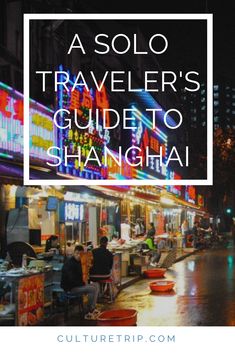 a city street at night with text overlay that reads a solo traveler's guide to shanghai