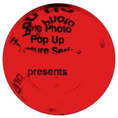 a red frisbee with the words pop up and more sari on it