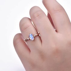 This is a faceted moonstone & moissanite engagement ring.A perfect anniversary gift, birthday gift,wedding engagement ring.Great as a gift or a anniversary ring. Ring Information Stone *8x5mm marquise cut Natural moonstone. *2mm round cut Forever Classical Moissanite. Metal * Solid 10k 14k &18k. *Color:white gold,yellow gold,rose gold. Custom Order *The main stone can be other gemstones you can imagine,any birthstone can be made.Please contact me if you need this service. *Any size *I ca Rose Gold Moonstone Ring For Promise, Rose Gold Moonstone Promise Ring, Rose Gold Moonstone Ring As A Gift, Moonstone Crystal Promise Ring With Accent Stones, Moonstone Crystal Ring With Accent Stones For Promise, Topaz And Moonstone Ring For Wedding, Moonstone Ring With Accent Stones As Gift, Anniversary Moonstone Ring With Rose Cut Diamonds, Anniversary Topaz And Moonstone Ring