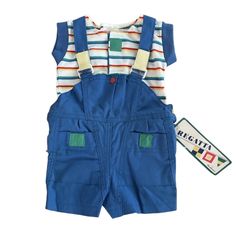 Size 6m Nwt Vintage Healthtex Shortall With Blue, Green, Yellow, Red And White Striped Shirt. Velcro Closure On Straps/Shirt, Elastic Waist And Snap Bottom For Easy Access To Changing. Measurements Lying Flat Length Of Shortall 16 1/2” Armpit To Armpit Of Shirt 10” Blue Overalls For Playtime In Spring, Blue Overalls For Summer Playtime, Blue Summer Overalls For Playtime, Playful Blue Cotton Overalls, Blue Overalls For Summer Playwear, Casual Blue Overalls For Playwear, Playful Blue Summer Overalls, Blue Shortalls For Spring Playtime