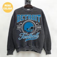 Perfect sweatshirt for Detroit football fans this season! Ideal for any situation, a unisex heavy blend crewneck sweatshirt is pure comfort. These garments are made from polyester and cotton. This combination helps designs come out looking fresh and beautiful. The collar is ribbed knit, so it retains its shape even after washing. There are no itchy side seams on these sweaters.  .: 50% cotton, 50% polyester .: Medium-heavy fabric (8.0 oz/yd² (271.25 g/m .: Loose fit .: Sewn-in label .: Runs true Heat Press Printing, Lions Football, Football Gift, Football Sweatshirt, Football Gifts, Football Fans, Football Shirt, Looks Vintage, Football Shirts