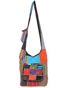 Tote your essentials in boho hippie style with this bold cotton handbag that will add a splash of flash to multiple ensembles. Each bag has its own order of patterns, and colors, but each style looks essentially like the picture displayed. Made in Nepal Fair Trade 100% Cotton Lined interior with side pocket Top zipper and button fastener Approximate Bag Size: 14" x 3.5" x 13" Shoulder Strap Length: 22" Hippie Purse, Boho Hippie Style, Boho Purse, Cotton Handbag, Hobo Crossbody Bag, Hippy Gifts, Hippie Bags, Boho Purses, Style Looks