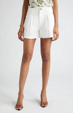 Keep your warm-weather look polished in these shorts impeccably tailored from stretch cotton and relaxed with front pleats. 4" inseam; 28" leg opening; 11 1/2" front rise; 15 1/2" back rise (size 44 IT) Zip fly with button closure Front slant pockets 95% cotton, 5% elastane Dry clean or machine wash, dry flat Made in Italy Designer Clothing Classic White High-waisted Bermuda Shorts, Elegant Knee-length Cotton Bermuda Shorts, Elegant Cotton Bermuda Shorts, Elegant Fitted Shorts With Pleated Waist, Elegant Fitted Pleated Waist Shorts, Classic White Bermuda Shorts For Work, Elegant Cotton Knee-length Shorts, Cotton Bottoms With Pleated Waist In Short Length, Cotton Bottoms With Pleated Waist And Short Length