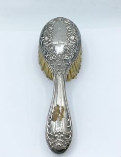 Anyone know where Mable is? I found her hairbrush. Antique Art Nouveau sterling silver hairbrush with floral motif. Engraved with original owner's name of Mable Wood. Brush is by Mechanics Sterling Company and marked sterling.  Measures - 7 3/4 x 2 3/8 inches, 19.69 x 6 cm Weight - 104.89 grams CONDITION:  The bristles need a cleaning and there's glue from a old price tag, but otherwise in excellent condition with no dings or dents. See pictures for details. If you like what you see here please Vintage Hair Brush Aesthetic, Coquette Hairbrush, Vintage Hair Brush, Old Hairbrush, Vintage Hairbrush, Vintage Brush Set, Antique Hair Brush, Hair Horn, Antique Hairbrush