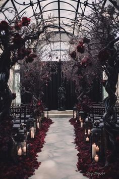 an outdoor ceremony set up with candles and flowers