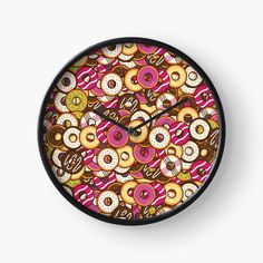 a clock with donuts all over it