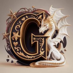 the letter g is decorated with a dragon and stars