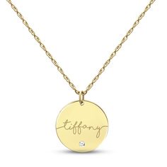 This gorgeous necklace features a 10K yellow gold disc inscribed with your name in an elegant script font. A bezel-set round diamond glitters beneath for a dazzling hint of sparkle. The pendant sways from an 18-inch rope chain that secures with a spring ring clasp. Elegant Round Disc Name Necklace For Anniversary, Elegant Script Fonts, Font A, Gold Disc, Diamond Glitter, Accessories Jewelry Necklace, Script Font, Gorgeous Necklaces, Rope Chain