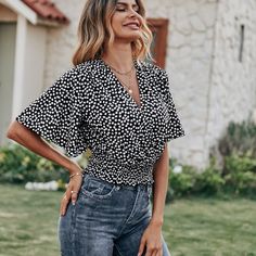 Xs=2 S=4 M=6 L=8/10 Xl=12 Xxl=14 Brand New Ships In 6-10 Days Color: Black And White Style: Boho Pattern Type: Ditsy Floral Type: Top Neckline: V Neck Details: Wrap, Shirred Sleeve Length: Half Sleeve Sleeve Type: Butterfly Sleeve Hem Shaped: Tight Hem Length: Crop Fit Type: Regular Fit Fabric: Non-Stretch Material: Polyester Composition: 97% Polyester, 3% Spandex Care Instructions: Machine Wash, Do Not Dry Clean Sheer: No Casual Black Blouse, Casual Black Blouse For Spring, Black Non-stretch Tops For Day Out, Black V-neck Blouse For Day Out, Non-stretch Black Top For Day Out, Chic Black Floral Print Tops, Black V-neck Summer Blouse, Black Tops For Day Out In Spring, Black V-neck Blouse For Spring