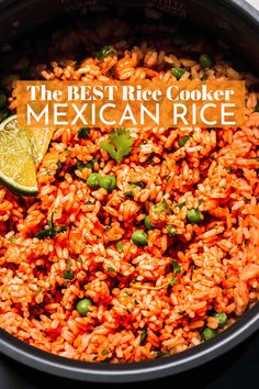 the best rice cooker mexican rice in a pot with lime and cilantro