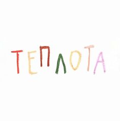 the word teatota written in colored crayons on a white paper background