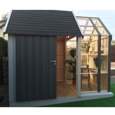 a small shed with the door open