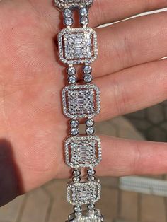 Men's 8.5" long 16mm wide bracelet
***Also available in size 7.5" please leave a message at the CHECKOUT screen where it says "Message to Seller". if you want the 7.5", otherwise we ship 8.5" by default ***
 
Heavy 39 grams.
 
20ct man made diamonds
Gorgeous baguette & round stones 
You can’t tell difference from natural diamonds without a microscope 
Super ICY you have to see to believe!!
 
Solid 925 silver
Not plated or filled...this i Wide Bracelet, Man Made Diamonds, Tennis Bracelet, Cz Stone, Natural Diamonds, 925 Silver, Tennis, Gold Plate, Plating