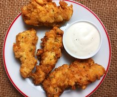 fried chicken with ranch dressing on a plate