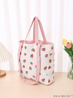 BagForLove - Polyester Storage Bag: Modern Cute Strawberry Pattern with Handle, Ideal for Kitchen, 1pc Product Description Color Multicolor Composition 50% Polyester Material Polyester Size Chart INCH CM Height Width Length Size 11.8 inch 3.5 inch 11 inch one-size Height Width Length Size 30 cm 9 cm 28 cm one-size Details Pictures Similar Products h2 { text-align: center; } /* æ¢è¡ */ li{ white-space: normal; word-break: break-all; word-wrap: break-word; } .red-box { width: 100%; display: flex; flex-direction: row; flex-wrap: wrap; justify-content: center; } .red-box > div { width: 190px; height: 250px; margin: 10px; } .red-box > div > a > img { width: 190px; height: 250px; } .size-box { width: 100%; margin: auto; white-space: nowrap; } .table { border-collapse: collapse; border-spacing: Red School Bag For Spring, Large Capacity School Bag For Summer, Summer Handheld Shoulder Bag For School, Summer School Handheld Shoulder Bag, Spring School Cotton Bags, Cotton School Bags For Spring, Handheld School Bag For Summer, Cute Cotton Bags With Adjustable Strap, Pink Cotton Bag For Summer