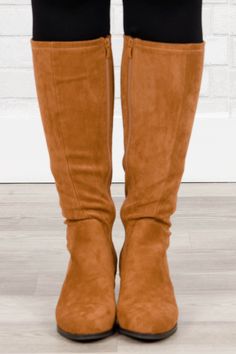 Run, run, runaway to the checkout with these gorgeous boots! They have a neutral camel color and a wide calf comfy fit that is so easy to pair with all of your favorite outfits throughout the season! *If you are in-between sizes, we suggest sizing up.* Casual Suede Heeled Boots For Winter, Wide Calf Suede Mid-calf Boots For Fall, Brown Knee-high Wedge Boots For Winter, Casual Suede Knee-high Boots With Wide Calf, Trendy Tall Brown Boots, Casual Tall Brown Boots, Casual Mid-calf Boots For Fall, Trendy Wide Calf Brown Boots, Trendy Brown Wide Calf Boots