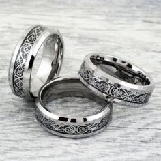 three wedding rings with celtic designs on them