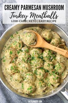 creamy parmesan mushroom turkey meatballs in a skillet with a wooden spoon