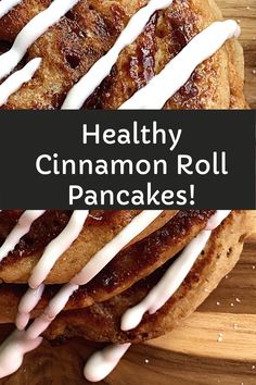 healthy cinnamon roll pancakes with white icing on a wooden cutting board and text overlay reads healthy cinnamon roll pancakes