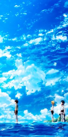 two people standing in the water looking at an island with blue sky and white clouds