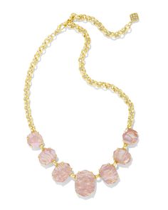 A nod to our much-loved statement necklace styles of the past, the Daphne Gold Statement Necklace in Light Pink Iridescent Abalone showcases seven stunning stones in our latest trend-setting shape. Pair it with the Daphne Statement Cuff for the ultimate showstopping look. Metal 14k Yellow Gold Over Brass Material Light Pink Iridescent Abalone Closure Lobster Clasp Size 19" Chain, 1.0" At CenterDue to the one-of-a-kind nature of the medium, exact colors and patterns may vary slightly from the ima Necklace Styles, Pink Iridescent, Gold Statement Necklace, Gold Band Ring, Latest Trend, Crown Jewels, Abalone Shell, Gold Drop Earrings, Brass Material