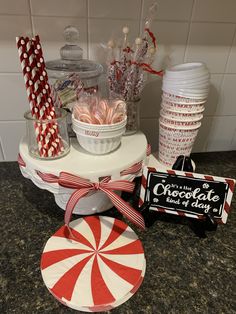 candy bar with red and white striped lollipops, candies, etc