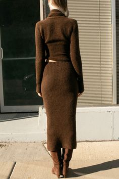 Long, fitted tube skirt in a soft ribbed knit. Covered elastic waistband. Fabric is 34% recycled polyamide 32% mulesing free merino wool 32% alpaca 2% elastane. Ella is 6' tall, 35" bust, 26" waist, 36" hip, and is wearing a size S. Knitted Skirt Aesthetic, Brown Knitted Skirt Outfit, Knitwear Skirt Outfit, Long Wool Skirt Outfit, Knit Skirt Outfit Winter, Long Skirts Winter, Knitted Skirt Outfit, Brown Knit Skirt, Wool Skirt Outfit