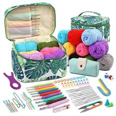 an open suitcase filled with crochet and knitting supplies