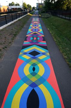 a long painted walkway with circles on it