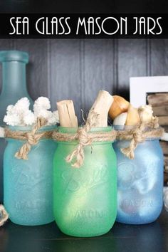 sea glass mason jars with rope and seashells in them