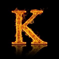 the letter k is made up of fire on a black background stock photo and royalty