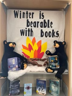 two stuffed bears sitting on top of a bookshelf with winter is bearable with books