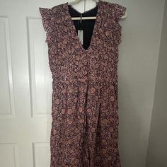 New With Tags, Out Of Stock Pattern Perfect For Summer To Fall Transition. Boho Oversized, Flowy Style In A Midi Cut. This Is A Petite Medium But This Style Runs Large, So It Fits More Like A Petite Large, Perfect For 5’5” Or Shorter. Questions? Leave A Comment Below! Mauve Sleeveless Dress With Floral Print, Mauve Floral Print Midi Dress, Purple Brunch Dress With Smocked Back, Purple V-neck Dress With Ruffle Hem, Purple Dress With Smocked Back For Brunch, Purple Midi Dress With Smocked Bodice, Purple Midi Dress With Ruffles, Purple Ruffled Midi Dress, Flowy Mauve Dress With Ruffles