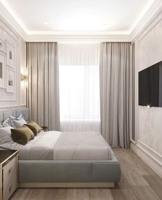 a bedroom with a large bed and white walls