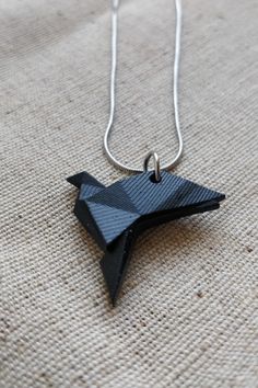 A lovingly necklace with a handmade pendant made from resin. Painted white or black. Thanks for looking, any questions please message me! Geometric Black Jewelry For Gifts, Unique Black Necklaces For Gifts, Unique Black Necklace For Gift, Unique Black Geometric Jewelry, Adjustable Geometric Black Jewelry, Adjustable Black Geometric Jewelry, Minimalist Black Necklace For Gift, Minimalist Handmade Black Necklace, Modern Black Geometric Necklace