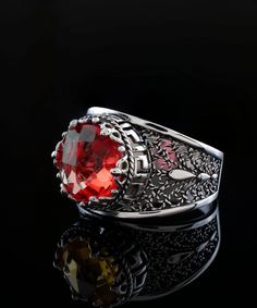 Elegance Redefined: Greek Key Filigree Art Crown Cocktail Ring with Ruby Gemstone Discover Timeless Beauty in Our 925 Sterling Silver Lace Embroidery Ring with Mesmerizing Ruby Gemstone Introducing our stunning Lace Embroidery Greek Key 925 Sterling Silver Filigree Art Crown Cocktail Ring, featuring a mesmerizing Ruby gemstone. The ring face measures 0.47" / 12.00 mm, while the 10 mm Ruby gemstone is double-sided faceted with a checkerboard round-cut. Ruby, a gem of passion, is the traditional b Formal Silver Engraved Ring With Birthstone, Ornate Rings With Accent Stones For Gift, Luxury Round Cut Filigree Ring As Gift, Ornate Silver Jewelry With Accent Stones, Luxury Filigree Ring With Round Cut For Gift, Luxury Filigree Ring With Round Cut As Gift, Ornate Ring Jewelry With Accent Stones, Gift Filigree Ring With Accent Stones, Exquisite Stone Setting Rings For Gift