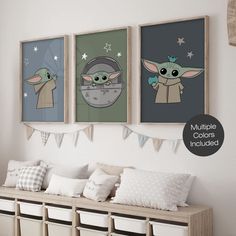 three baby yoda posters hanging on the wall above a bench with storage bins