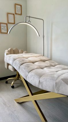 an ironing board in a room with white walls