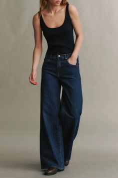 Mid-rise, wide leg Jean in vintage inspired dark wash denim. The Tiny Dancer is relaxed at the hip, wide at the leg, and features a five-pocket style, detailed with nail head rivet hardware. Complete with a zip-fly, belt loops, and a shank button at the waistband. Pants For Belly, Dark Wash Vintage Jeans, Dark Denim Wide Leg Jeans, Vintage Latina Fashion, Dancer Off Duty Style, Dark Denim Jeans Outfit Winter, Dark Wash Wide Leg Jeans, Wide Leg Dark Jeans Outfit, Dark Wash Wide Leg Jeans Outfit